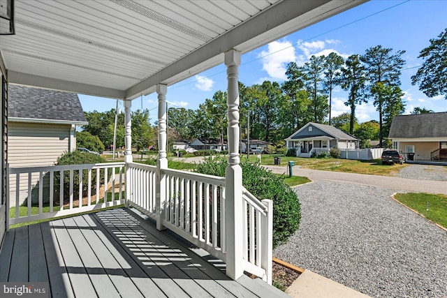 wooden deck featuring covered porch