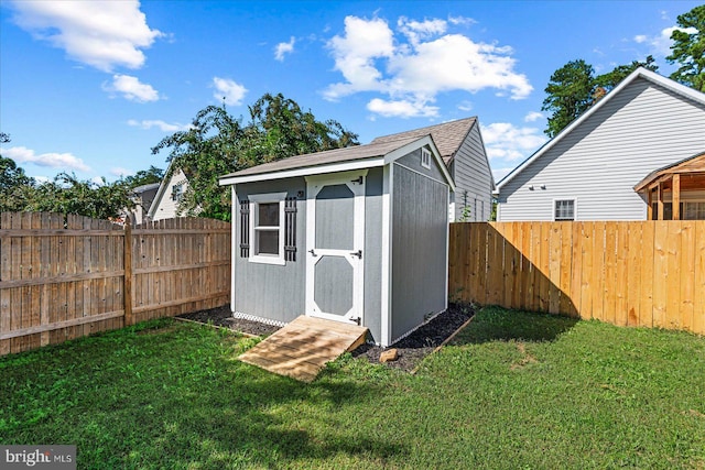 view of outdoor structure with a yard