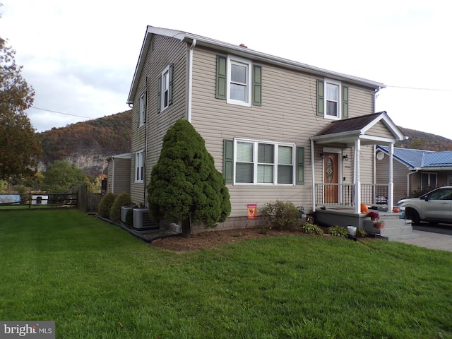 front facade with a front lawn