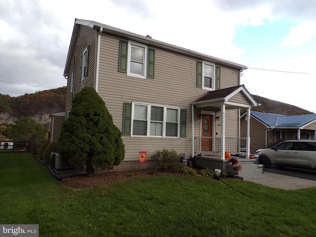 front of property featuring a front lawn