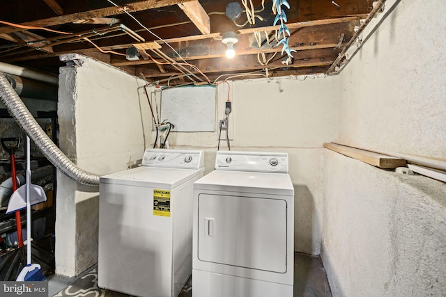 laundry room with independent washer and dryer