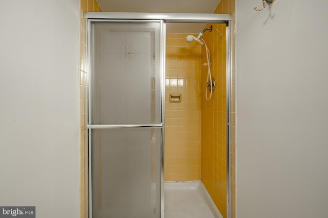 bathroom with an enclosed shower