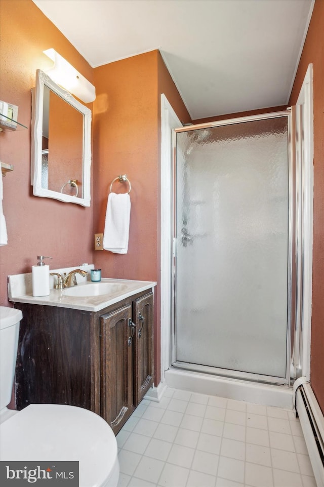 bathroom with a baseboard radiator, a shower with door, toilet, and vanity