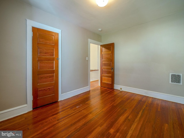 unfurnished bedroom with wood-type flooring