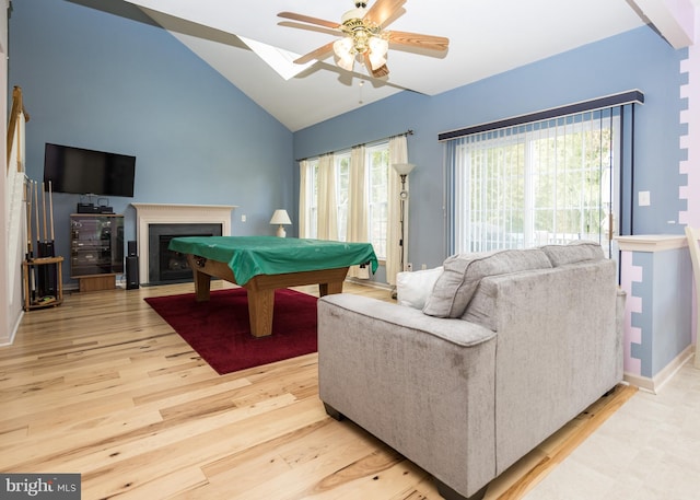 recreation room with ceiling fan, light hardwood / wood-style flooring, pool table, and vaulted ceiling