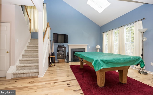 rec room with lofted ceiling, wood-type flooring, and billiards