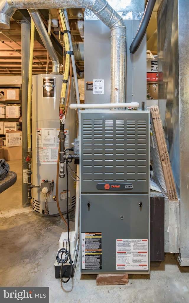 utility room with water heater