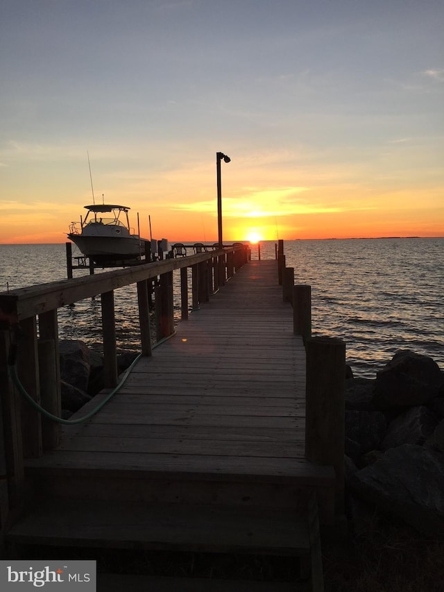 view of dock with a water view