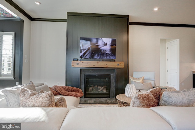 living room featuring crown molding