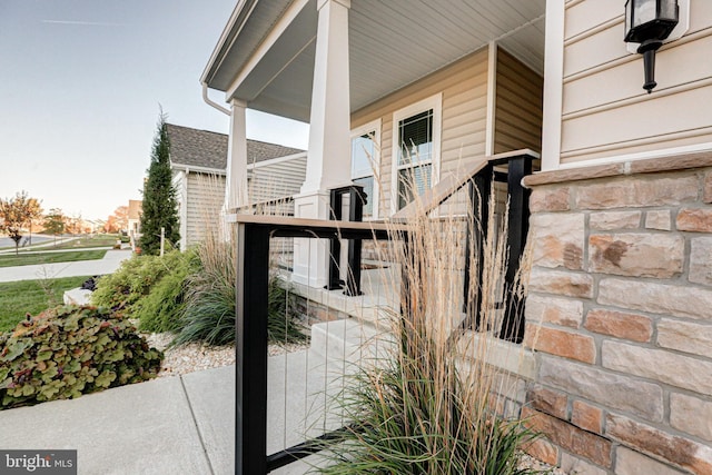 view of home's exterior with covered porch