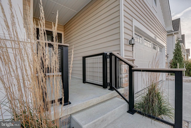 doorway to property featuring a garage