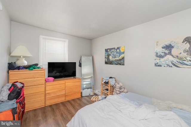 bedroom featuring dark hardwood / wood-style floors