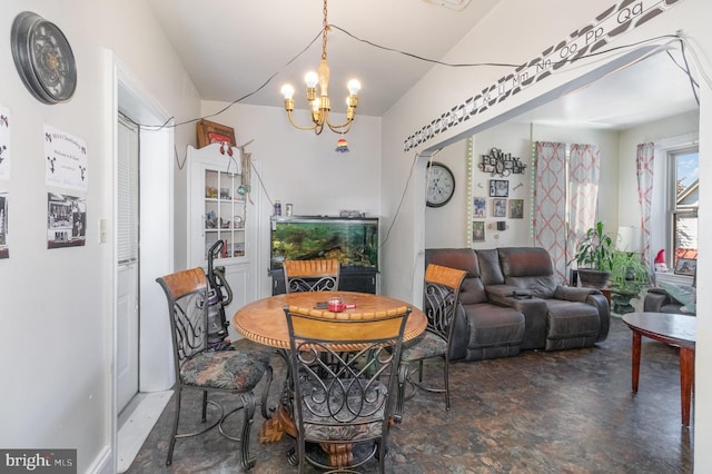 dining area featuring a notable chandelier