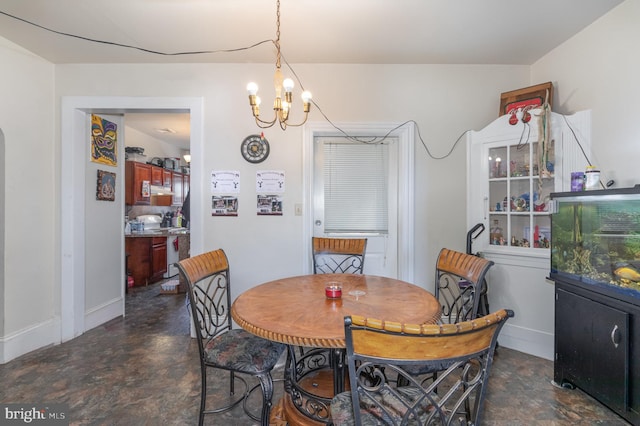 dining room with a chandelier