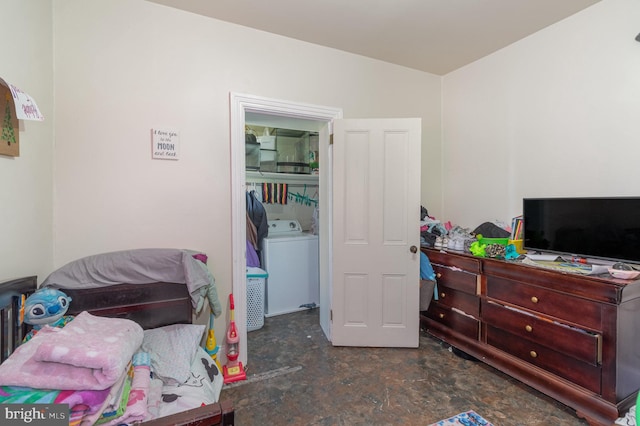 bedroom featuring washer / clothes dryer