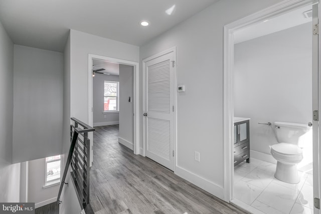 hallway featuring light hardwood / wood-style flooring