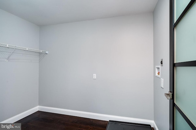 walk in closet featuring hardwood / wood-style floors