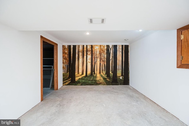 spare room featuring ornamental molding