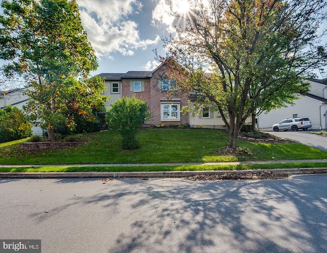 view of front of home with a front lawn