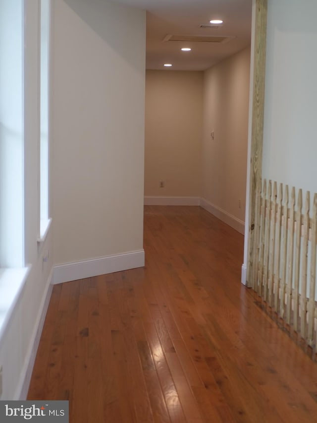 empty room featuring hardwood / wood-style flooring