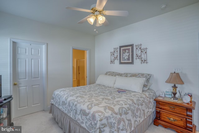 bedroom with light carpet and ceiling fan