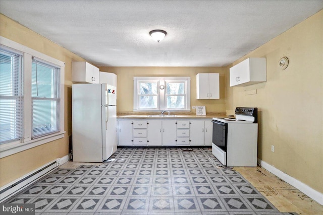 kitchen with baseboard heating, white appliances, sink, white cabinetry, and a textured ceiling