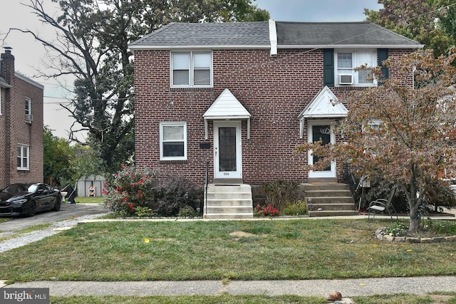 view of front of property with a front yard