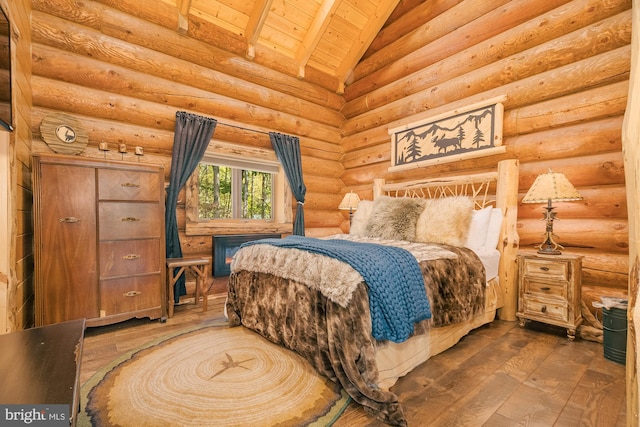 bedroom with vaulted ceiling with beams, dark hardwood / wood-style floors, wooden ceiling, and log walls