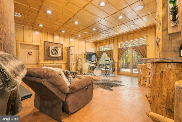 living room with wooden walls