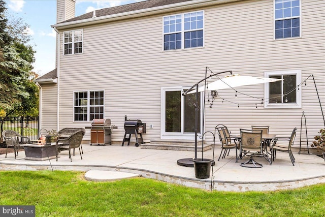 rear view of property with a patio