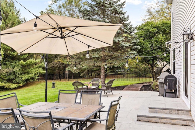 view of patio featuring a grill