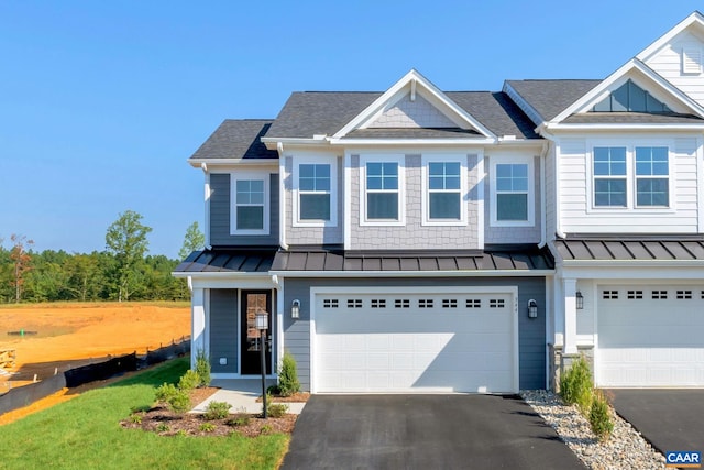 view of front of property with a garage