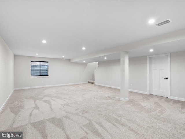 basement with light colored carpet