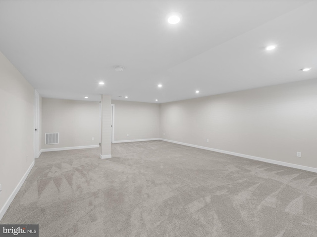 basement with light carpet