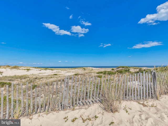 property view of water with a beach view