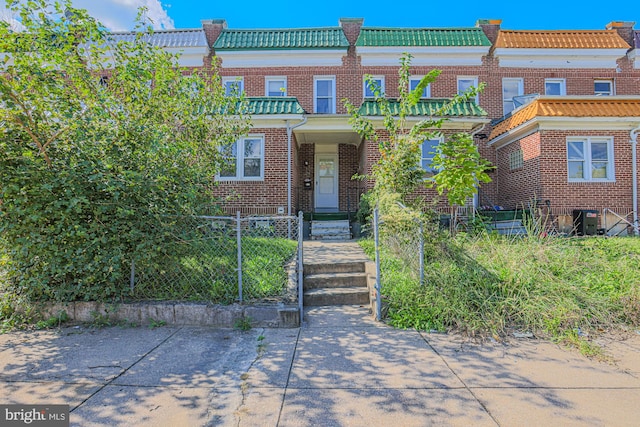 view of front of home with central air condition unit