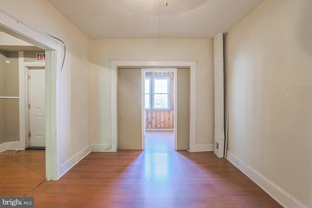 hallway featuring hardwood / wood-style floors