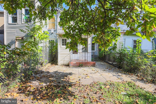 view of front of property with a patio