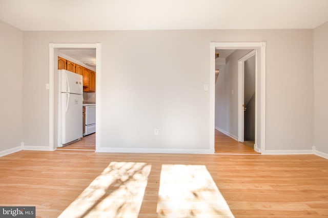 unfurnished room featuring light hardwood / wood-style floors