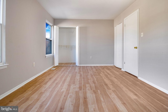 unfurnished bedroom with light hardwood / wood-style flooring