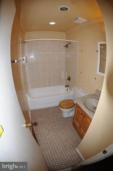 full bathroom with toilet, vanity, tiled shower / bath, and ornamental molding