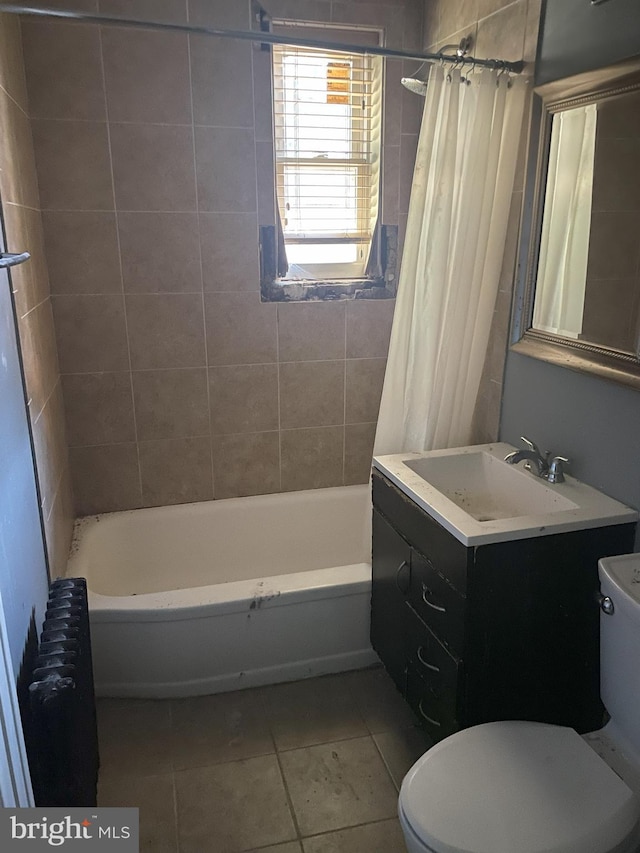 full bathroom featuring toilet, tile patterned floors, radiator, vanity, and shower / bath combination with curtain