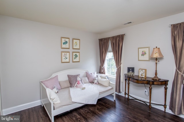 bedroom featuring dark wood-type flooring