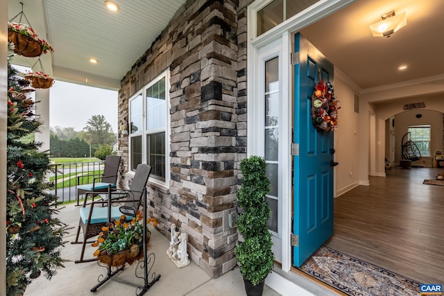 property entrance featuring covered porch