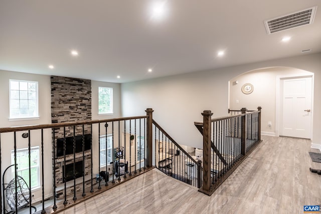 interior space featuring light wood-type flooring and a wealth of natural light