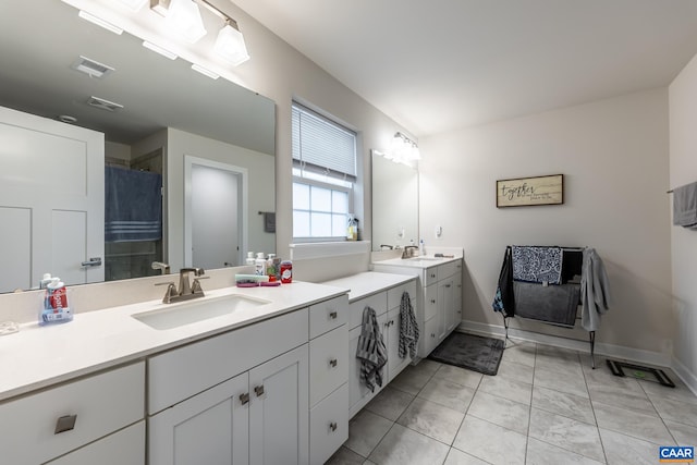 bathroom with a shower with shower curtain and vanity