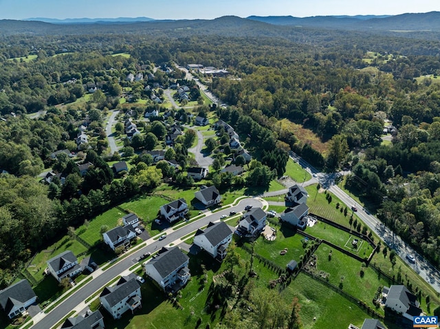 drone / aerial view featuring a mountain view