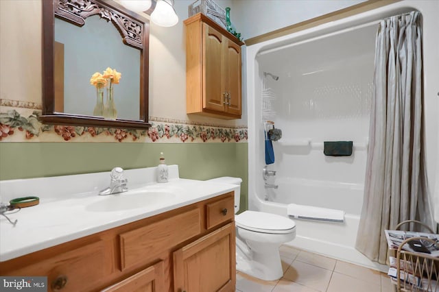 full bathroom with vanity, toilet, tile patterned floors, and shower / tub combo