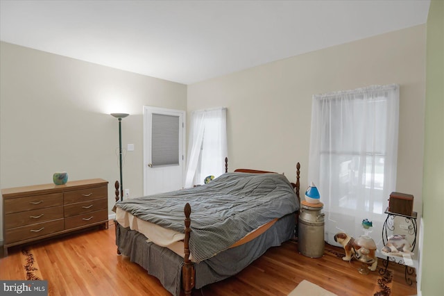 bedroom featuring light wood-type flooring