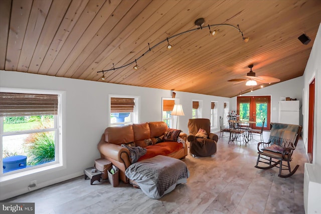 living room with lofted ceiling, wood ceiling, and plenty of natural light